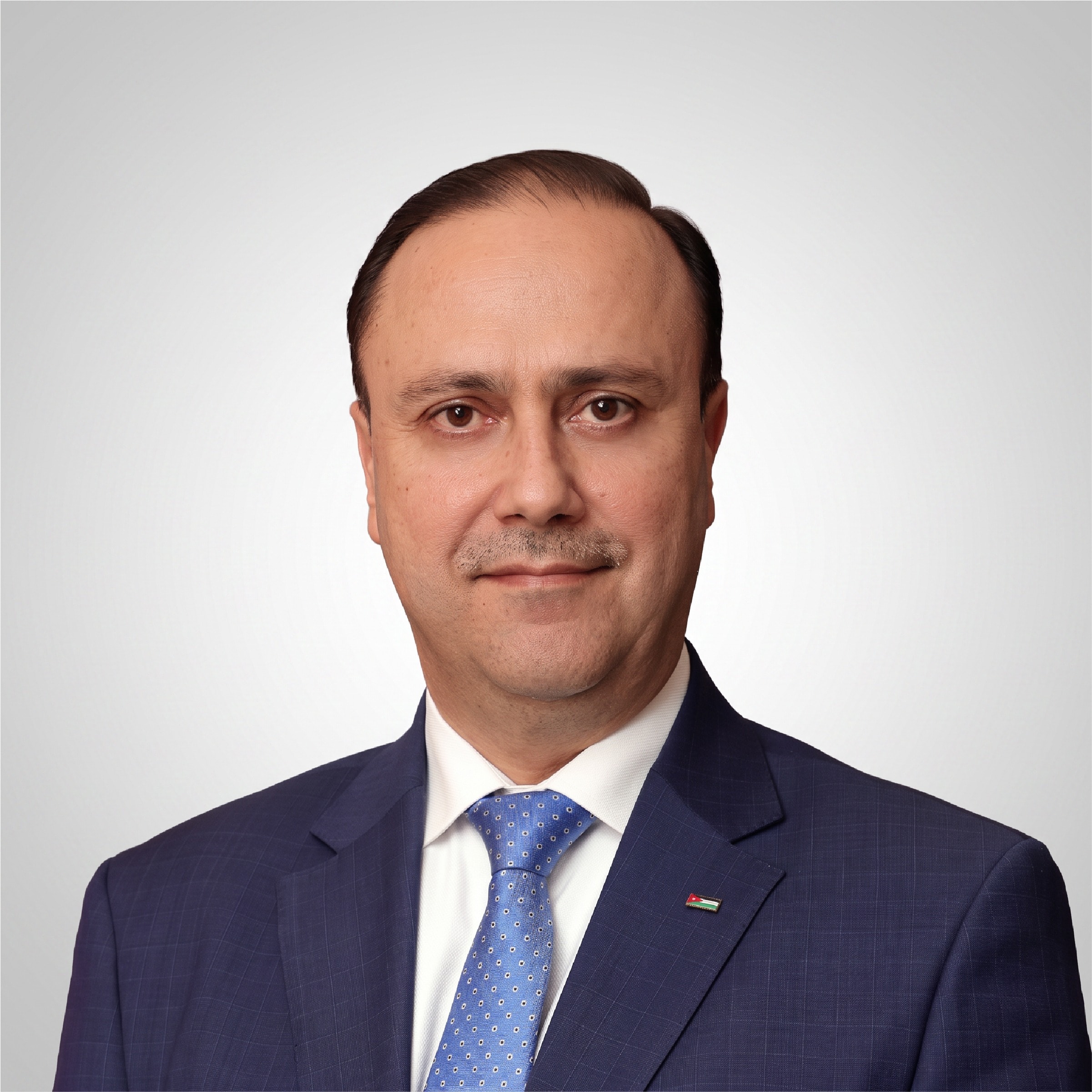 H.E. Dr. Mohammad Hussein Al-Momani